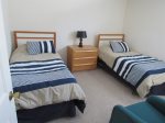 Two Twin Beds in  Bedroom of Waterville Valley Vacation Rental 